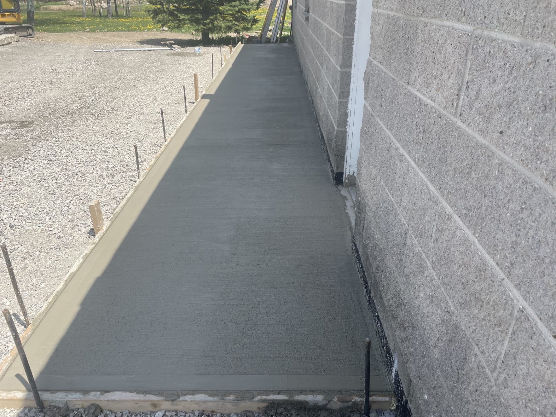 Concrete sidewalk installation — after
