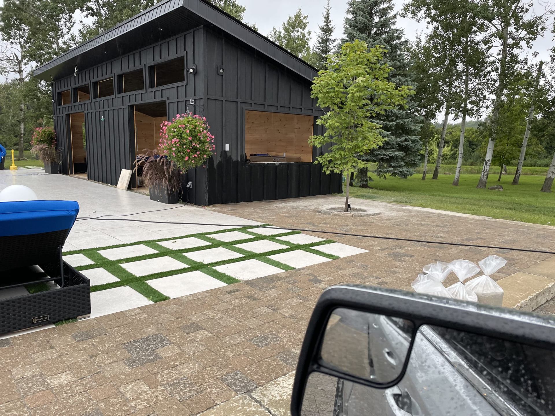 Finished interlocking patio with turf-inlaid slab walkway in Vaughan